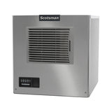 A stainless steel Scotsman air-cooled ice maker with a horizontal vented grille on the front, digital control panel with buttons and display at the lower left, and the Scotsman brand name up top. The unit has a boxy, industrial design and produces cube style ice.