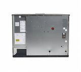 A large, rectangular stainless steel ice machine viewed from the back shows a flat silver panel with screws, labels, a red connector, and attached diagrams. The black edges and flat top suggest industrial or Prodigy ELITE Ice Maker equipment.