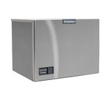 A stainless steel Prodigy ELITE Ice Maker by Scotsman with a rectangular shape, front control panel featuring four buttons, and the Scotsman logo at the top. This water-cooled ice maker produces medium cube size ice with a modern, industrial look.