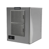 An air-cooled stainless steel Scotsman ice maker with two vertical vented panels on the front, a small black control display at the bottom left, and a solid side panel. The unit stands on small feet against a plain white background.