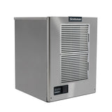 A stainless steel Scotsman ice maker featuring an air-cooled, vented front panel, a control panel with buttons at the bottom left, and a black logo at the top. Its compact, modern design suits both commercial and home use.
