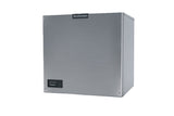 A stainless steel Prodigy ELITE Ice Maker with a smooth, box-shaped exterior. The front features a small black control panel in the lower left corner and a Scotsman logo near the top. Perfect as a commercial ice machine. Background is plain white.