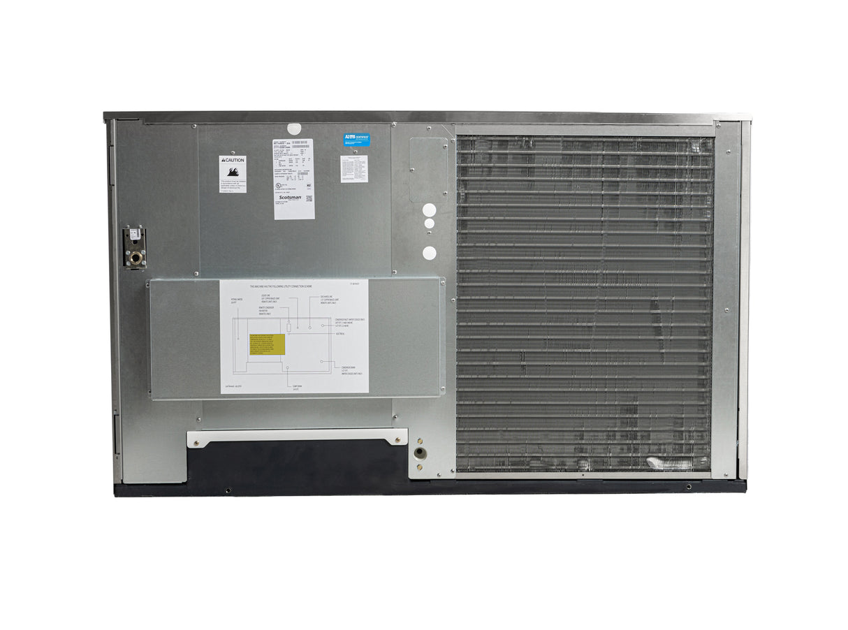 A large rectangular metal air-cooled ice machine HVAC unit with a visible wiring diagram, labels, and control panel on the left; the right side features a large metal coil grid. The unit is photographed against a plain white background.