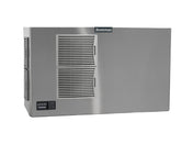 A commercial Scotsman air-cooled ice machine in stainless steel, featuring two horizontal vents on the left side and a small control panel with buttons at the bottom left. The sleek unit boasts clean edges and a prominent Scotsman logo on the upper vent.