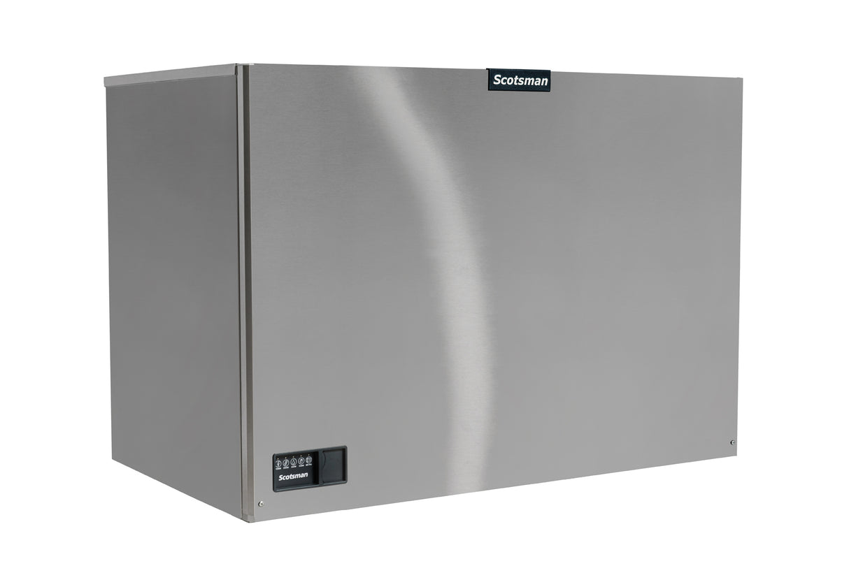 A large, rectangular stainless steel Prodigy ELITE Ice Maker with a smooth front, labeled “Scotsman” at the top center and a small digital control panel on the bottom left. This remote condenser ice maker features a reflective, brushed metal surface.