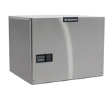 A stainless steel Prodigy ELITE Eclipse Ice Maker with a rectangular shape. The front panel features a small black control panel and the Scotsman logo. This high capacity ice machine has a smooth, reflective surface for modern commercial spaces.
