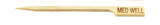 A bamboo meat marker pick with a pointed end and MED WELL engraved on the flat handle, indicating a medium well doneness. The wood grain is visible, and the marker is photographed against a white background.