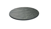 A round, flat, dark grey black slate serving plate with a textured, wavy surface pattern is shown against a white background. The plate appears thin, making it an ideal display tray with a natural, stone-like appearance.