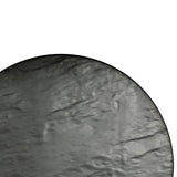A close-up of a round, flat melamine surface with a smooth, slightly crinkled texture in gray, set against a white background. Only the lower-left portion of the circle is visible, creating a minimalist composition.