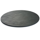 A round, flat, black Frostone Collection Display Tray with a textured surface and subtle grooves. This break resistant tray features a matte finish and is photographed on a white background.