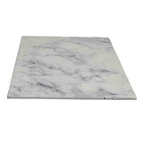 A square slab of white marble with subtle gray veining runs across its smooth, flat surface. The photo is taken at a slight angle, highlighting the Frostone Display Tray’s natural pattern and polished finish. The plain white background emphasizes the stone.