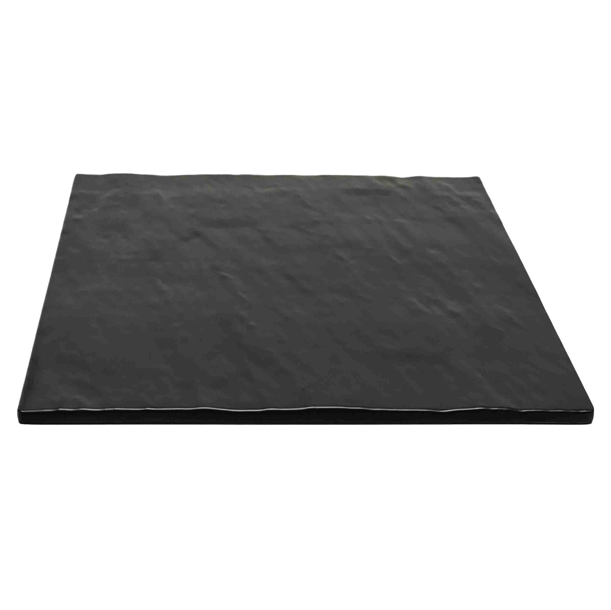 A flat, rectangular black slate display tray with a slightly textured, uneven surface and irregular edges, viewed from a low angle against a white background. The break resistant plate appears smooth and thin, ideal for serving food or as a decorative platter.