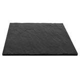A flat, rectangular black slate display tray with a slightly textured, uneven surface and irregular edges, viewed from a low angle against a white background. The break resistant plate appears smooth and thin, ideal for serving food or as a decorative platter.