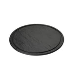 A round, flat black slate tray with a slightly raised edge is shown against a plain white background. Part of the Frostone Collection Display Tray line, it features a smooth surface with subtle natural texture and veining typical of slate.