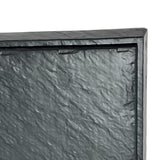 A close-up of a black, textured rectangular surface with a raised border. This Frostone Collection Display Tray, made from break resistant melamine, shows only the upper left corner of the tray against a white background.