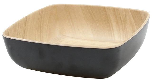 A square, shallow Frostone Naturals Bowl with rounded edges. The smooth, matte black exterior contrasts the natural light wood grain interior. This TableCraft bowl is empty and sits on a white background.