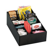 A black plastic condiment organizer holds various packets including Hot Cocoa Mix, Lipton tea, sugar, sweetener, creamer, and stir sticks, all arranged neatly in divided compartments—perfect as a straw organizer too.