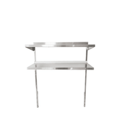 A stainless steel wall-mounted table with an adjustable overshelf, supported by brackets and two vertical legs. The sleek, industrial design suits kitchens or workspaces. A plain white background highlights the table’s metallic surface and clean lines.