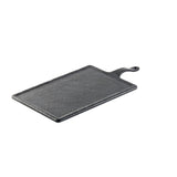 A rectangular, dark gray cutting board resembling a black slate Frostone Serving Paddle, with a textured surface, rounded edges, and an attached handle featuring a small hole for hanging. The board is set against a white background.