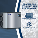 A silver, box-shaped ice maker with vents and a digital display stands on a bed of ice. Text highlights features: “Crafted for efficiency,” “Air-cooled self-contained condenser—reduce energy,” and “R-410A refrigerant—48% less global warming potential.”.