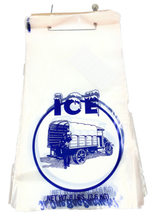 A plastic bag with a blue illustration of a vintage Manitowoc truck loaded with ice blocks and a man standing beside it. The word ICE appears above, dusted with snow. Text at the bottom reads NET WT. 8 LBS. (3.6 KG). Perfect for use with ice bag ties.