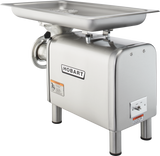 A large stainless steel Hobart Meat Chopper bench type with a 1-1/2 HP motor, featuring a rectangular tray on top, grinding mechanism on the left, sturdy legs, control switches on the side, and the Hobart brand label prominently displayed.