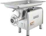 A silver Hobart Meat Chopper with a 1-1/2 HP motor features a large rectangular tray on top, metal grinding parts in front, a side-mounted handle, and warning labels. This bench type machine stands on four sturdy legs.