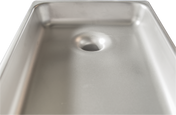 Close-up view of a clean, empty Hobart stainless steel sink with smooth, reflective surfaces and a centered drain hole. The gently rounded edges and metallic texture echo the quality found in a Rectangular Grind Pan, emphasizing depth and durability.