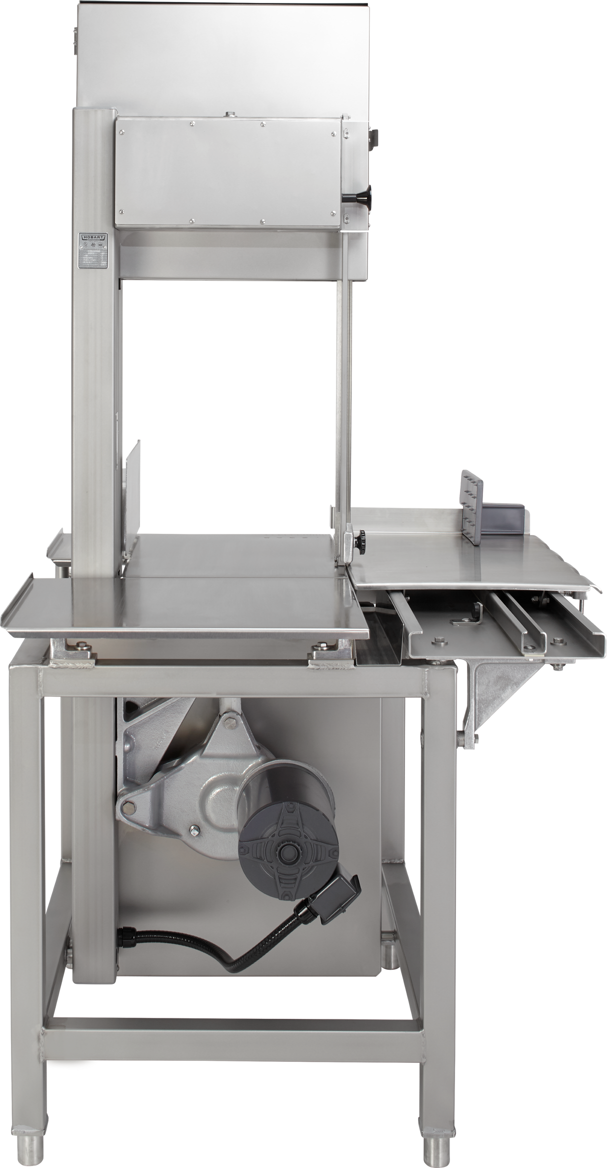 A commercial Meat Saw features a stainless steel frame, large cutting table, safety guard, and vertical blade with adjustable thickness guide—designed for industrial meat processing. Visible beneath the table are the motor and belt mechanisms.