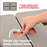 A hand connects two gray corrosion proof polymer dunnage racks using an orange connector. Text reads, Connect multiple racks for end-to-end and back-to-back NSF configurations—no tools needed. A diagram above shows possible rack setups.