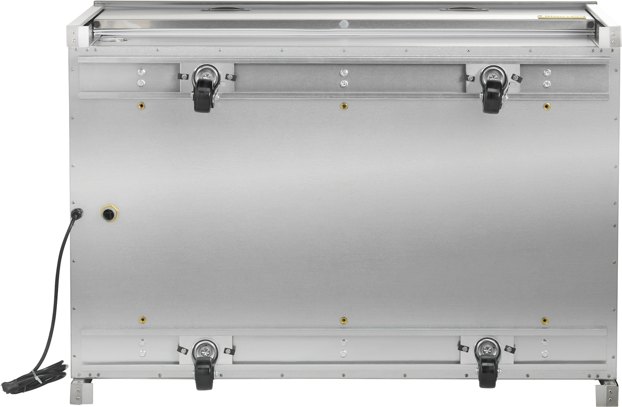 A large, stainless steel milk cooler is shown from the back. Four black caster wheels are attached at the bottom, and an electrical cord extends from the left side. The smooth surface has visible screws, yellow highlights, and a double access design.