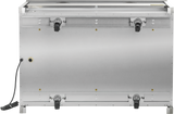 A large, stainless steel milk cooler is shown from the back. Four black caster wheels are attached at the bottom, and an electrical cord extends from the left side. The smooth surface has visible screws, yellow highlights, and a double access design.