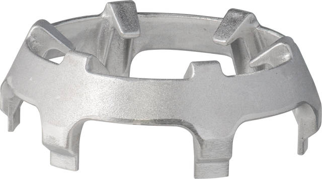 A metallic, circular object with a rough, matte finish. It features six raised rectangular prongs and six open gaps, resembling a gear or crown—likely a Hobart bowl truck adapter for 140 to 60 qt bowls—photographed on a white background.