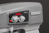 A close-up of a gray Hobart Legacy floor type mixer control panel. The panel features a red digital display, speed and time dials, and buttons labeled “Start,” “Stop,” and “Hobart.” The metal Hobart logo is prominently displayed on the right.
