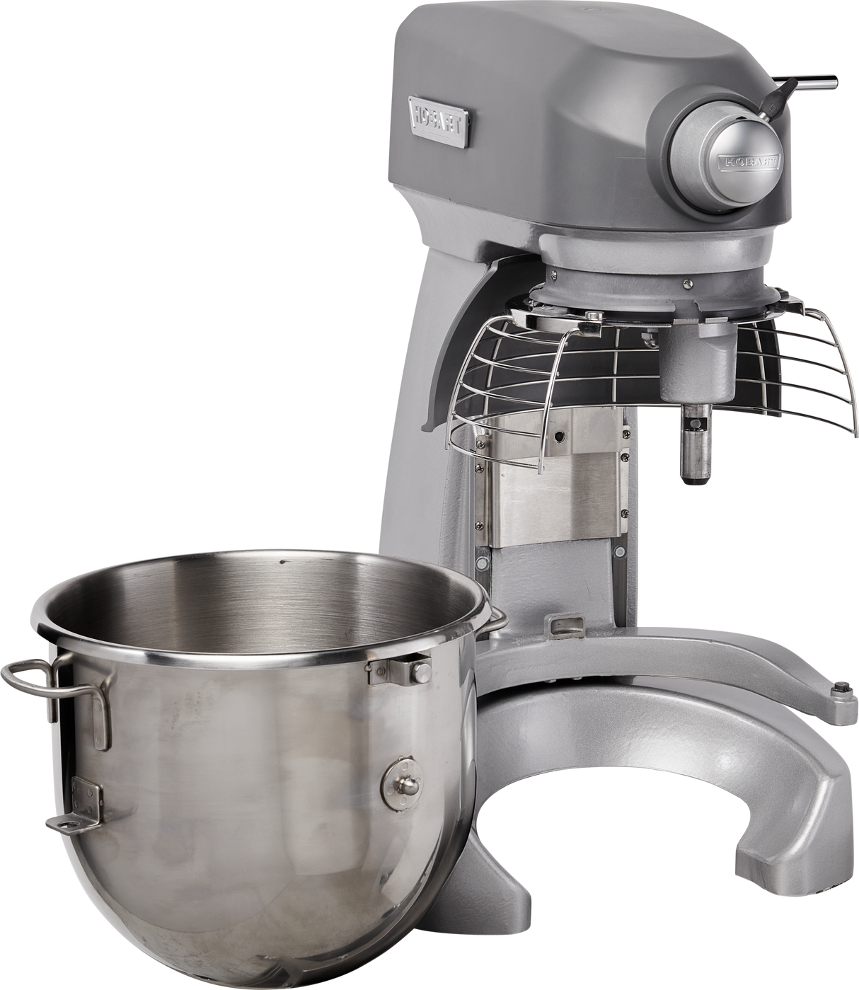 A large, industrial floor type mixer with a grey metallic body and protective wire guard is shown. Its stainless steel mixing bowl is detached and placed in front, highlighting the mixers commercial planetary mixer design. The background is plain white.