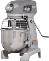 A large industrial floor type mixer with a stainless steel bowl, protective wire guard, control knobs, and levers. The machine has a sturdy base and side handle for adjusting the bowl position. The brand “Hobart” and model “Legacy+” are visible.