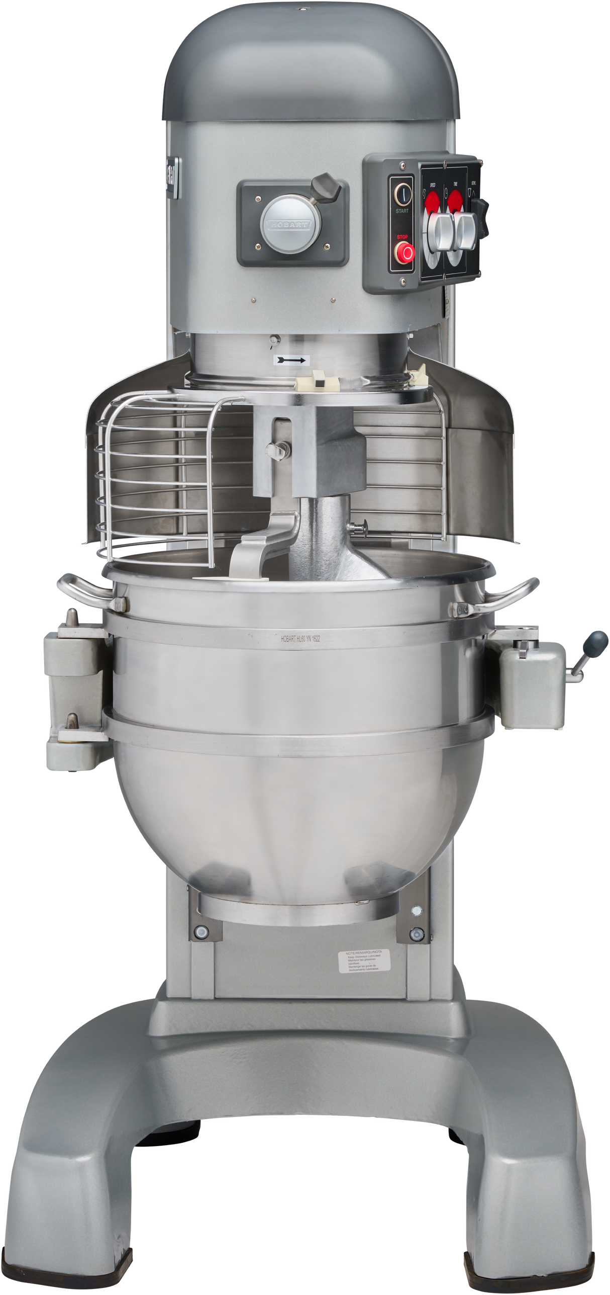 A large, industrial Hobart mixer with a metal bowl, protective wire guard, and various control switches on the side. The gray Legacy Planetary Mixer features a solid base and a side lever for adjusting the 60 qt mixer bowl height.