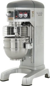 A large, silver Hobart Legacy pizza planetary mixer features a protective metal cage over its 60 quart stainless steel mixing bowl. The control panel has red and black buttons and dials, while the mixer stands on a wide, sturdy base.
