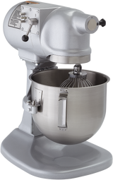 A commercial-grade, metallic silver Hobart N50 mixer with a large stainless steel mixing bowl and whisk attachment. This 5 quart mixer features control levers, a speed dial on the side, and stands on a sturdy base against a plain white background.