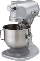 A silver Hobart N50A-10 planetary bench mixer with a large stainless steel bowl and wire whisk attachment. The mixer features a side lever, the “Hobart” brand on the upper right, and a wide, sturdy base.