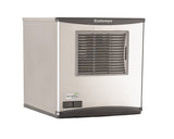 A stainless steel Scotsman commercial ice machine with a vented front panel, black trim, and a control panel on the lower left side displaying “Prodigy Plus.” The modern, boxy design sits on a plain white background. Great for producing chewable ice.