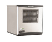 A stainless steel Scotsman commercial ice machine with a vented front panel, black trim, and a control panel on the lower left side displaying “Prodigy Plus.” The modern, boxy design sits on a plain white background. Great for producing chewable ice.