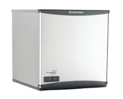 A stainless steel Scotsman nugget ice maker with a smooth, slightly curved front panel, digital control display at the lower left, and “Scotsman” branding at the top. Compact and modern, it delivers soft chewable ice in a sleek boxy design.