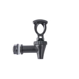 A black plastic replacement faucet with a horizontal nozzle, attached nut, and top lever handle is shown on a plain white background. Ideal for beverage dispensers, the spigot's cylindrical shape highlights its simple, functional design.
