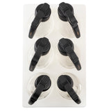 Six empty glass coffee carafes with black handles are arranged in two columns and three rows on a white rectangular tray, resembling a set of elegant salad dressing dispensers. The carafes’ handles all point toward the upper left corner.