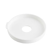 A round, shallow, white plastic tray from TableCraft Products with a raised edge and a large circular hole in the center. The tray features a small tab on one side and is dishwasher safe. The background is plain white.
