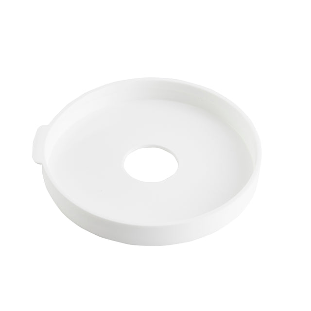 A round, shallow, white plastic tray from TableCraft Products with a raised edge and a large circular hole in the center. The tray features a small tab on one side and is dishwasher safe. The background is plain white.