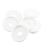 Five round, white plastic lids with a central circular hole are stacked and overlapping each other on a white background. These dishwasher safe Pump Snap Caps from TableCraft Products feature smooth surfaces and slightly raised edges.
