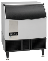A stainless steel ice maker with black side vents, four short legs, and a curved black door labeled ICE. The front panel displays a Cornelius logo and a small colorful sticker. It’s ideal as an under counter ice maker for full-size ice cubes.