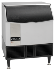 A stainless steel ice maker with black side vents, four short legs, and a curved black door labeled ICE. The front panel displays a Cornelius logo and a small colorful sticker. It’s ideal as an under counter ice maker for full-size ice cubes.